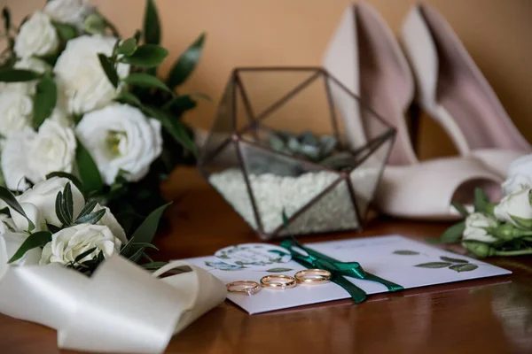 wedding rings on the table