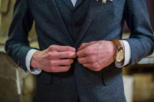 groom with suit and bow-tie