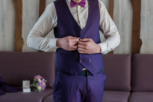 man in purple suit