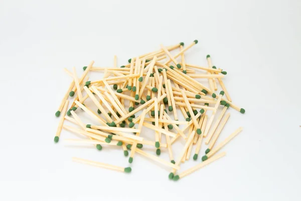 a bunch of matches on a white background