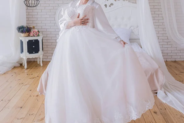 Bride Peignoir Holds Wedding Dress — Stock Photo, Image