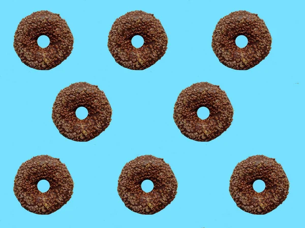 Leckere Schokoladen Donuts Auf Buntem Blauem Hintergrund Ansicht Von Oben — Stockfoto