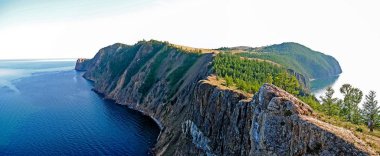 Baikal lake summer landscape, view from a cliff, Russia clipart