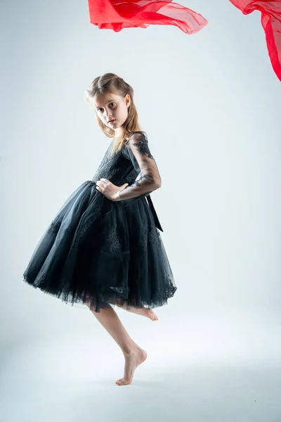 Little Kid Girl Model Black Dress Photo Studio Gray Background — Stock Photo, Image