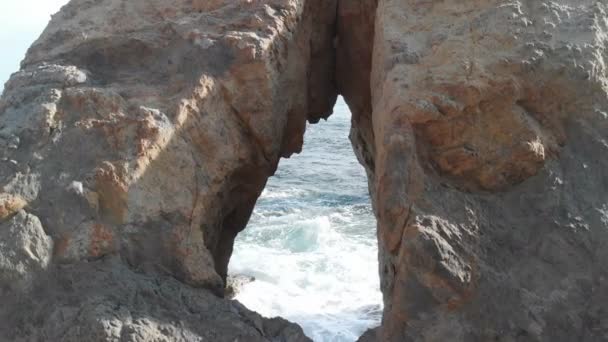 Crane Jib Shot Malibu Arch Rocks Shore — стокове відео