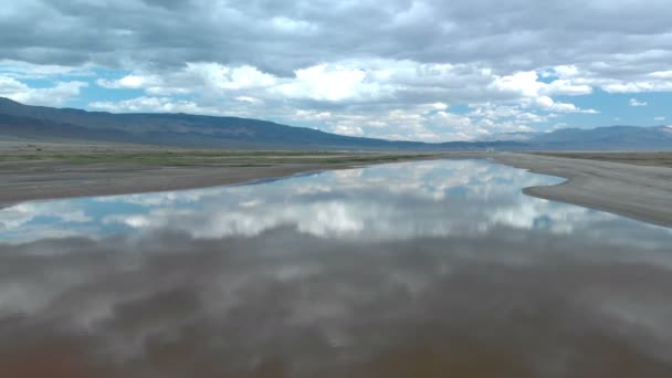 Aerial Shot Death Valley Mountains Reflected Lake California Left — Stock Video