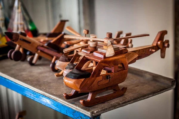 a wooden helicopter toys line in store market in malioboro jogja yogyakarta indonesia