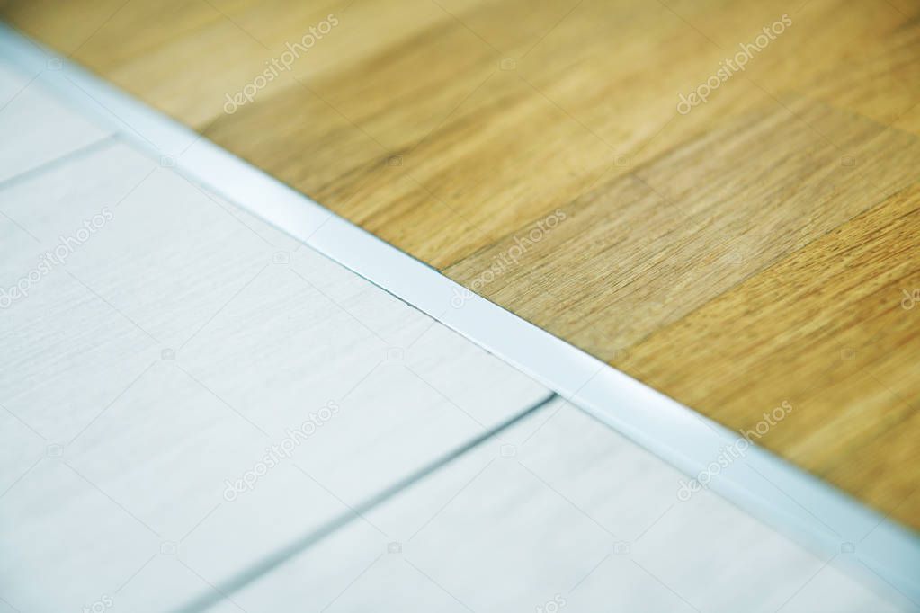 aluminum threshold between ceramic tiles and parquet