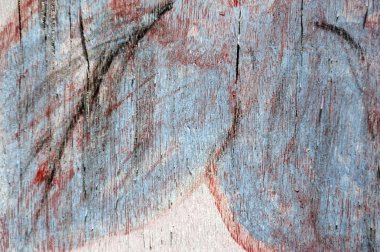 Ahşap bir yüzey üzerinde soyut parlak çok renkli çizimler