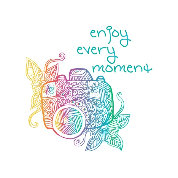 Photo camera with enjoy every moment hand lettering.