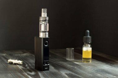 Vape veya e-sigara. Vaping masaya ayarla.