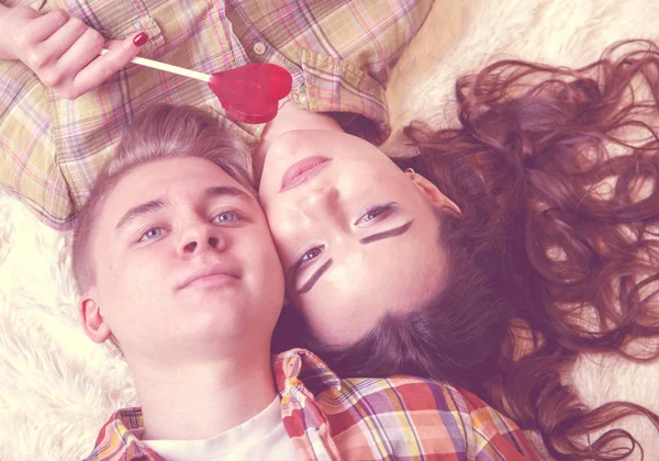 Happy Young Couple Lying Back Dreaming Toned — Stock Photo, Image