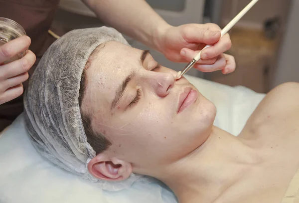 Face Care.  Smooth Skin. Cosmetology face care for a teenager  boy years old
