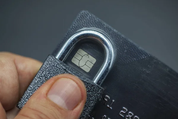 Electronic money saving, credit card protection, credit card lock close-up