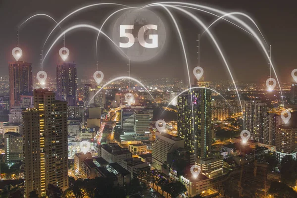 5G network wireless systems. 5G network digital planet hologram and internet  on city background