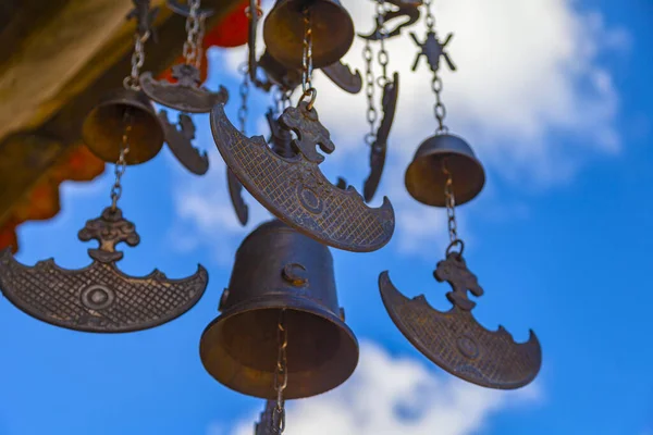 Chinese bronze bells made of bronze hanging on the roofs of a pagoda