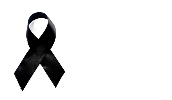 Black awareness ribbon.Mourning and melanoma symbol. Isolated on white — ストック写真