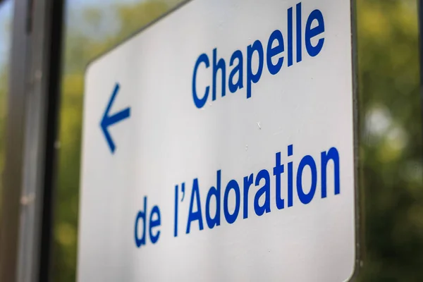 Lourdes France White Sign Indicates Blue Direction Chapel Adoration — Stock Photo, Image