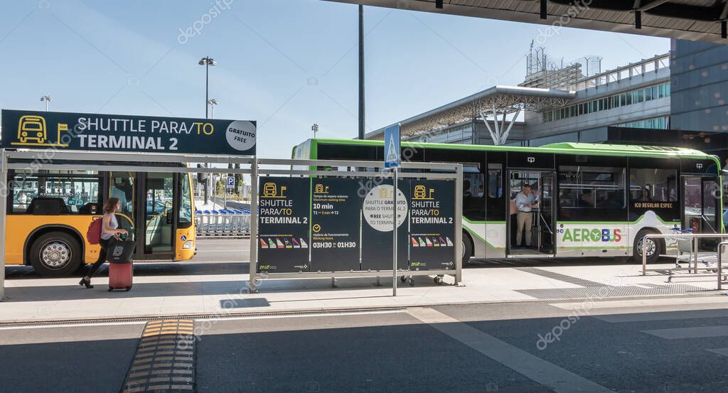 Lisbon, Portugal - May 11, 2018: Shuttle parked in front of Terminal 2 of Lisbon International Airport waiting for passengers on a spring day