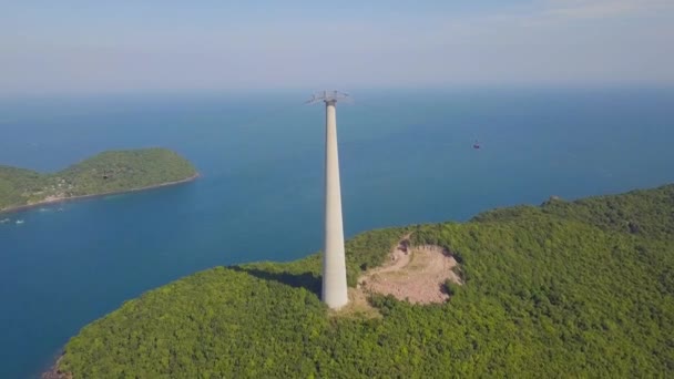 Aerial fly over green forest mountain with Aerial ropeway transit ART in island — Stock Video