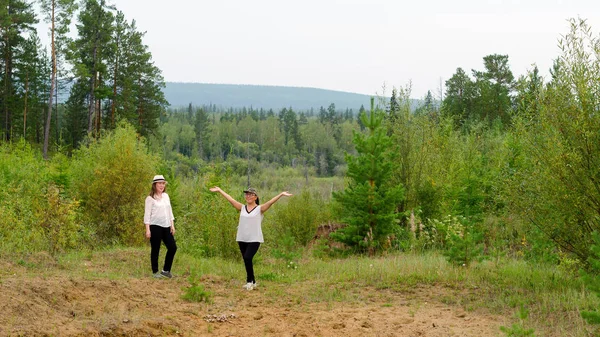 Two Joyful Girls Friends Asian Yakut Stand Mountain Slope Taiga — Stock Photo, Image