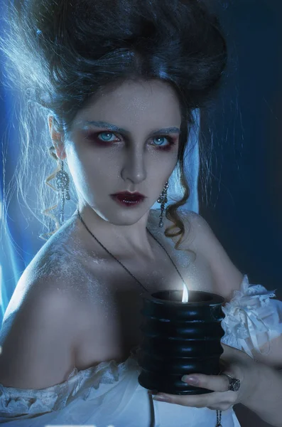 Beautiful girl ghost, witch, dead bride in a white dress with vintage hairstyle. Studio shot — Stock Photo, Image