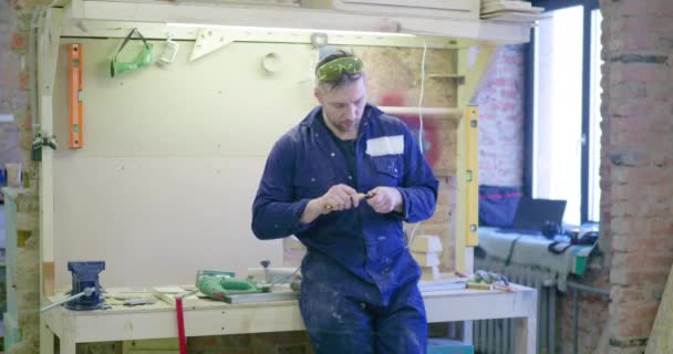 Man Carpentry Shop Standing Bench Sharpening Pencil — Stock Video