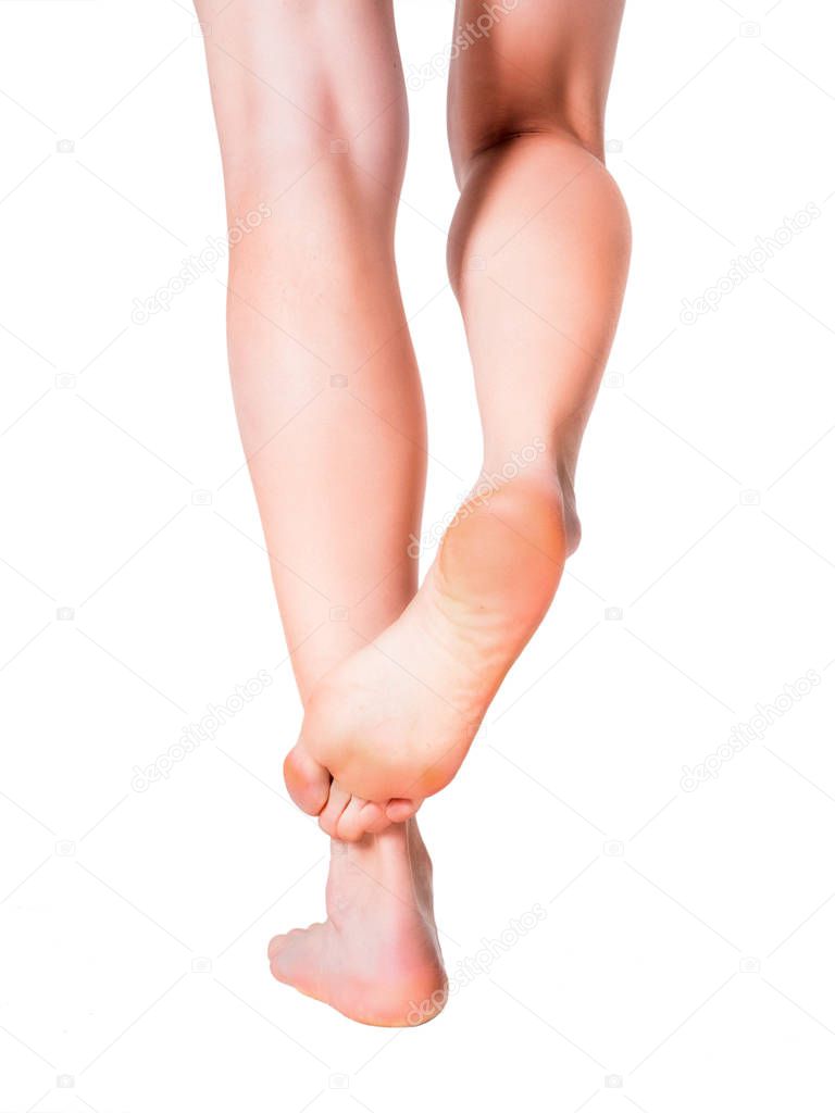 nicely nursed women's feet on white background