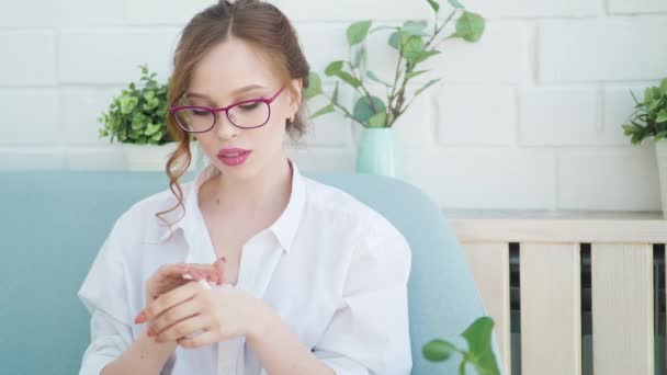 Woman Applies Cream Her Hands Close — Stock Video