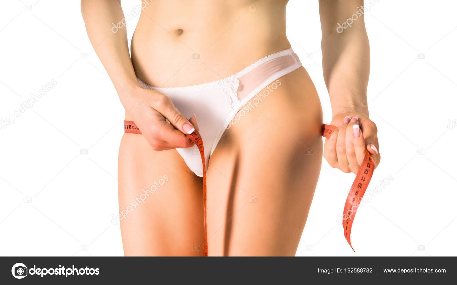 Young Girl In White Underwear Measures Her Ass Stock Photo Young Girl In White Underwear Measures Her Ass Stock Photo
