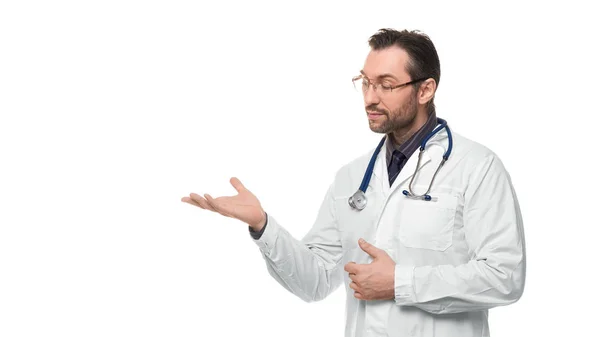 Medical doctor with stethoscope showing by hand on your product. — Stock Photo, Image