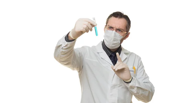 Male doctor looking on a test tube with virus sample in his hand. Medical concept — Stock Photo, Image