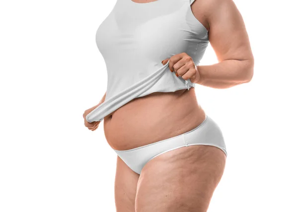 Nahaufnahme Foto eines Körpers einer dicken Frau isoliert über weißem Hintergrund. — Stockfoto