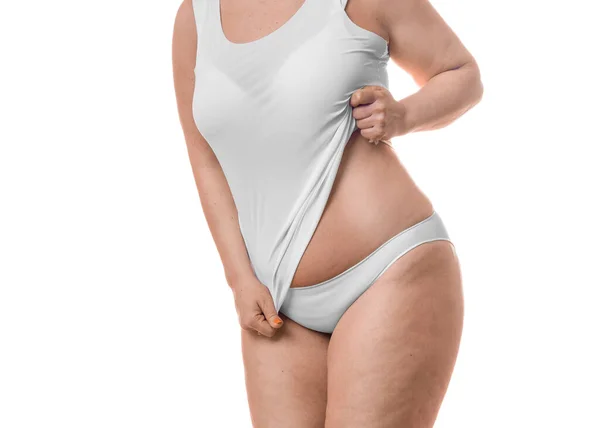 Крупним планом фото товстої жінки, що показує талію ізольовано на білому тлі . — стокове фото
