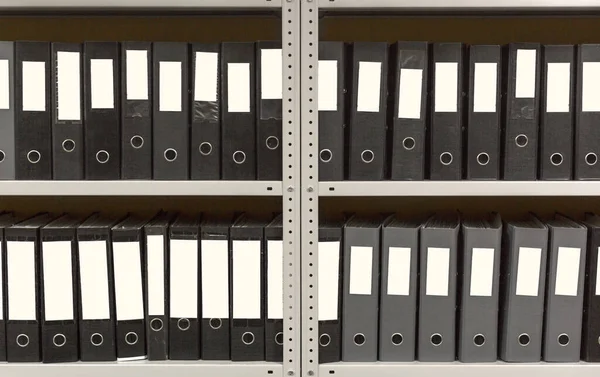 A lot of folders in the archive shelf.