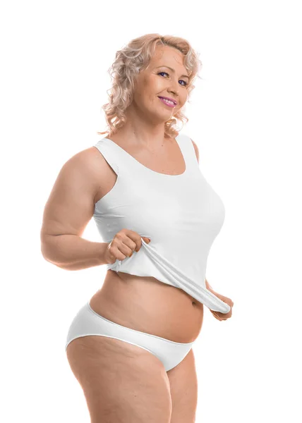 Felice modello di mezza età plus size in lingerie bianca su sfondo bianco . — Foto Stock