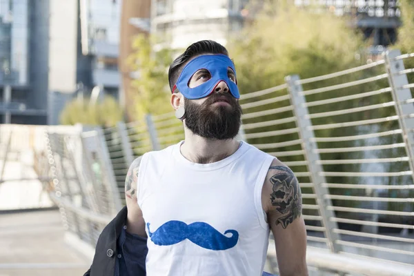 Young hipster superhero fights evil — Stock Photo, Image