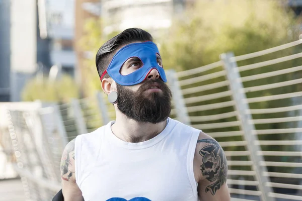 Young hipster superhero fights evil — Stock Photo, Image