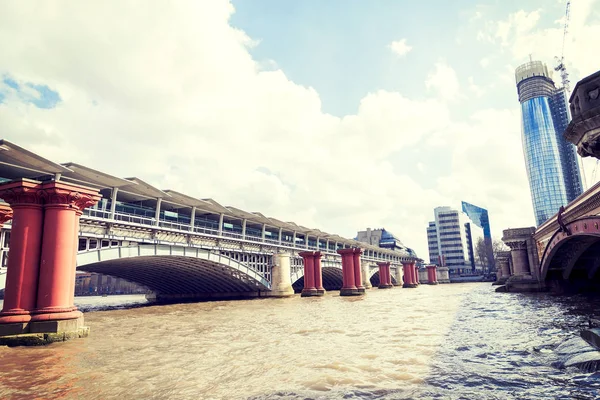 Red pillars for the construction of a bridge — Stock Photo, Image