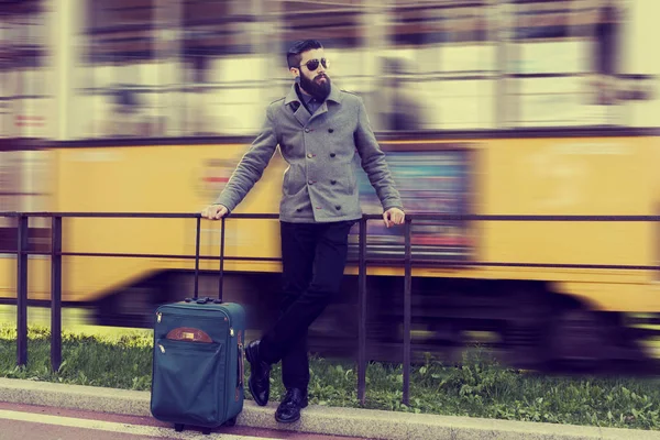 Portrait of young hipsters businessman at the bus stop — Stock Photo, Image