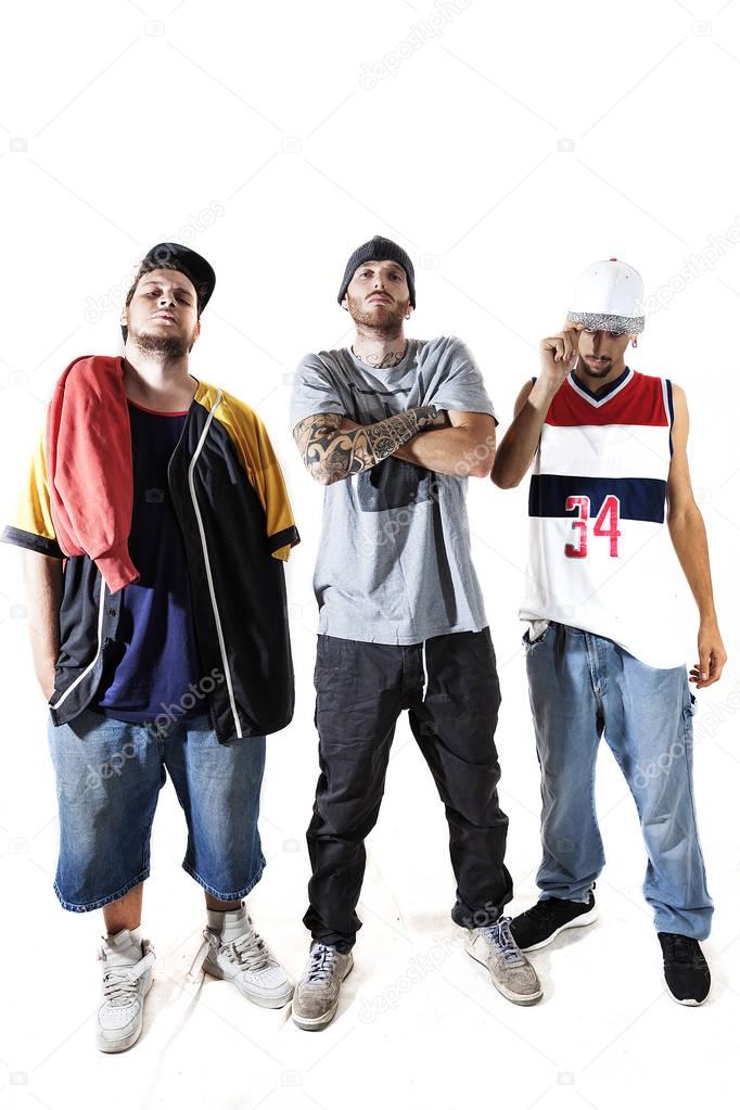 group of three rappers posing in the photographic studio