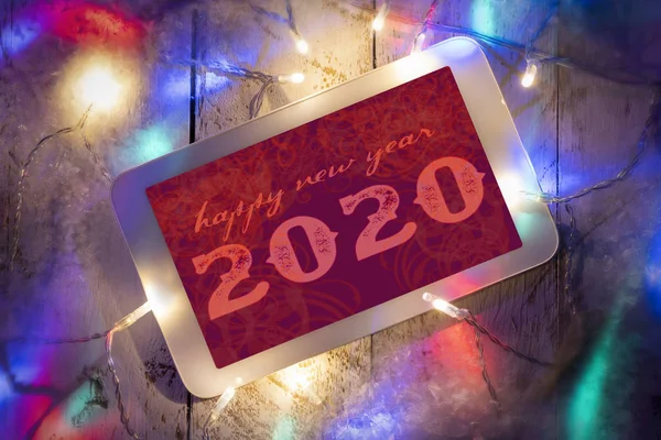 Celebração de 2020 ano novo na exposição do smartphone em — Fotografia de Stock