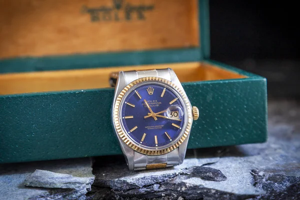 Rolex Oyster Blue watch on rock background — стокове фото