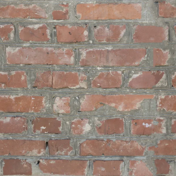 Sorunsuz doku bir tuğla duvar. Sorunsuz arka plan