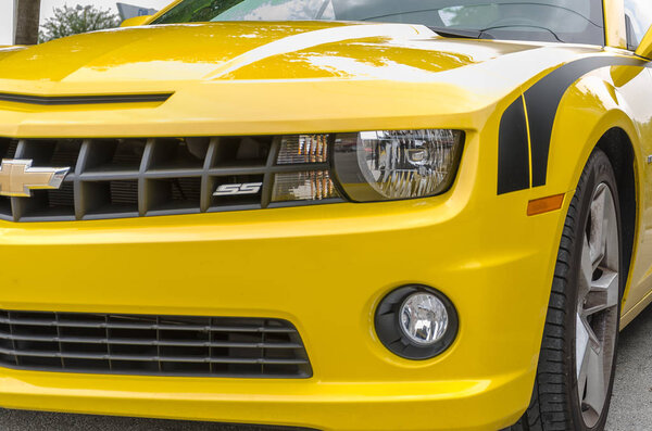 Yellow Chevrolet Camaro SS convertible front side details