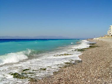 Zevk ve Rodos çakıl plajı yüzme turist 