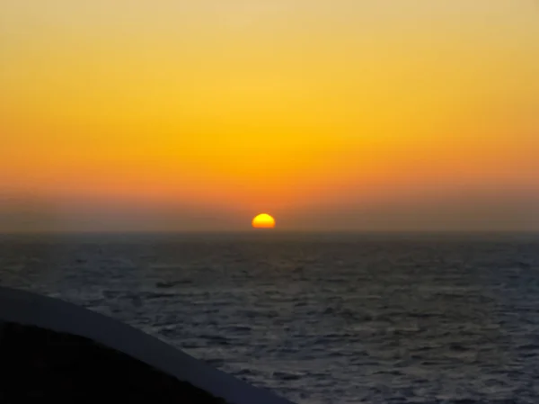 La puesta de sol en la isla de Mykonos en Grecia — Foto de Stock