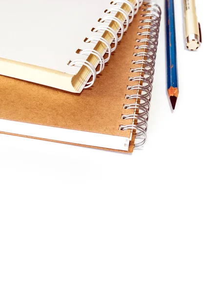 The spiral notebook with pencil and pen — Stock Photo, Image