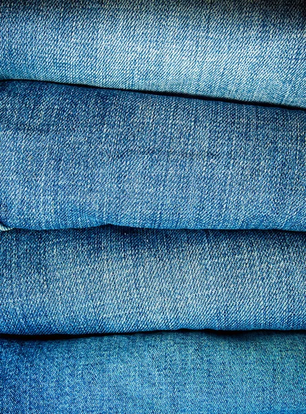 Hromadu modré džíny, textilie textura — Stock fotografie