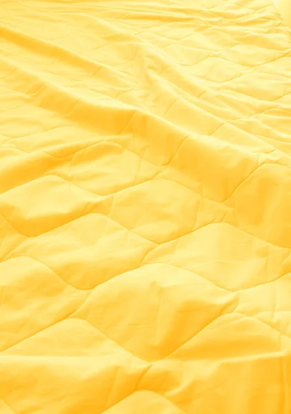 Blanket crumpled on the bed — Stock Photo, Image